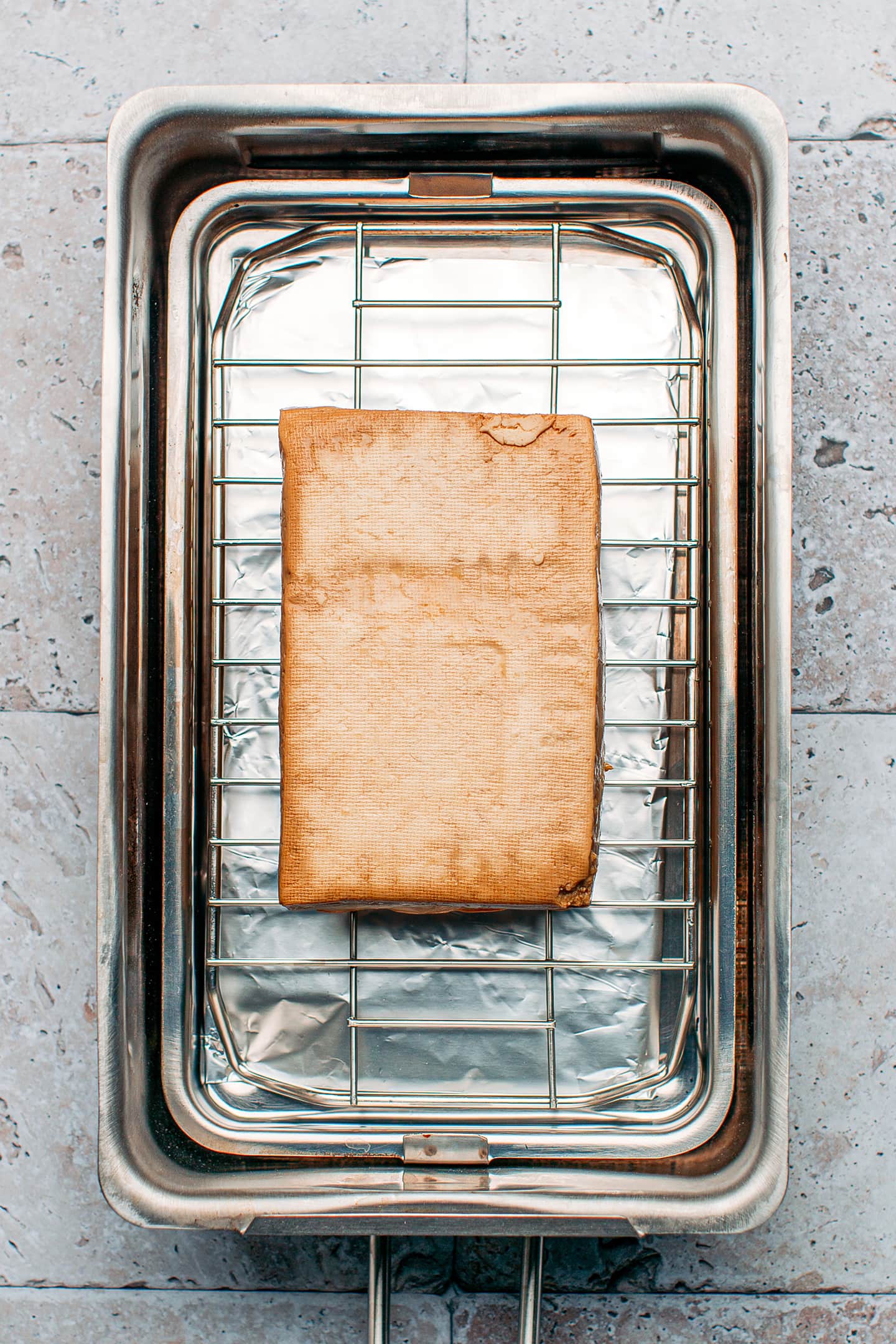 Marinated tofu in a stovetop smoker.