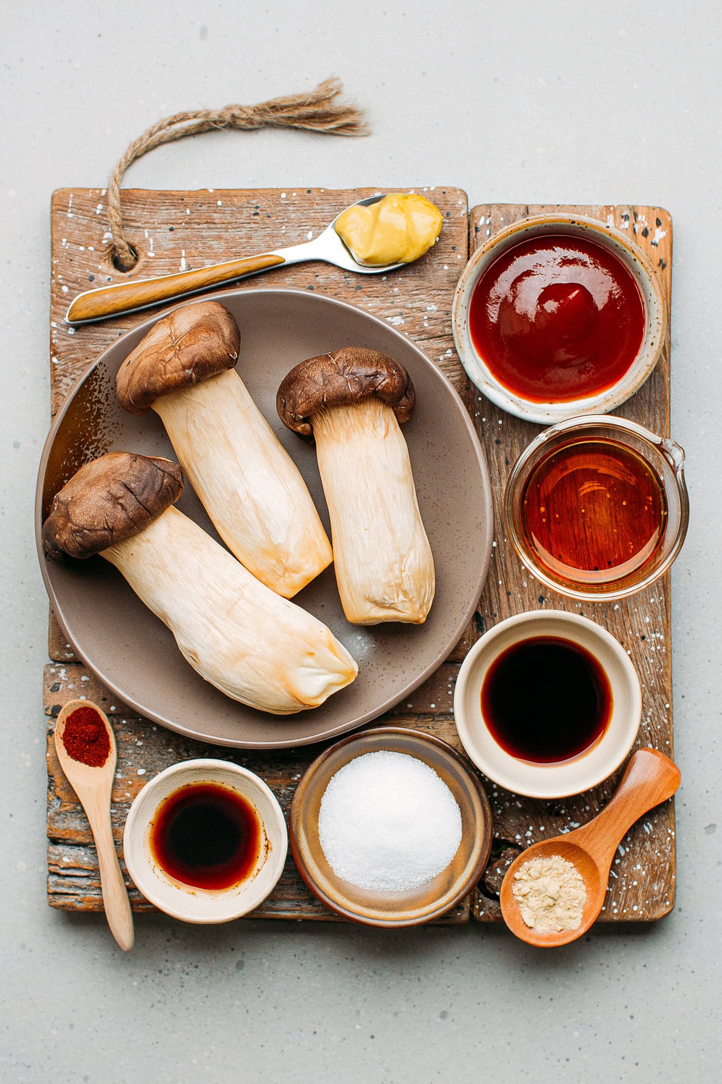 Ingredients like king oyster mushrooms, soy sauce, mustard, apple cider vinegar, and ketchup.